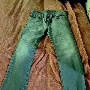 Men’s Diesel Jeans grey in color. Gently worn & no stains